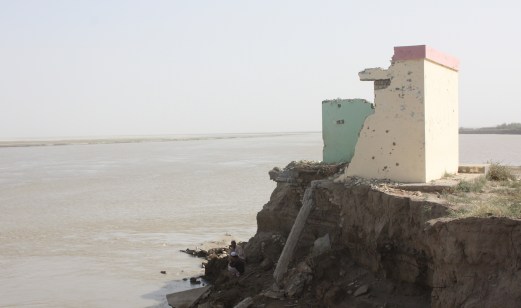 A school close to disappearing into the Amu Darya river (Copyright: Joe Dyke)